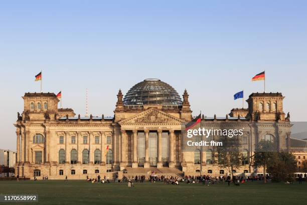 reichstag building (german parliament building) - berlin, germany - kuppel stock-fotos und bilder