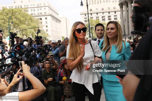 Jennifer Araoz who claims that Jeffrey Epstein raped her in his New York townhouse in 2002 when she was only 14, speaks to the media with her lawyer...