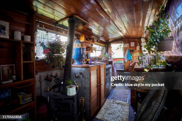 the interior of a narrow boat - narrow kitchen stock pictures, royalty-free photos & images