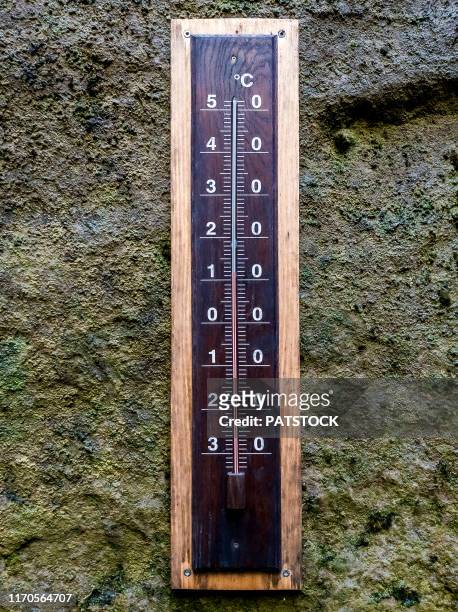 thermometer showing 12 celcius degrees in siberia gorge in teplice rocks in the vicinity of teplice nad metují, czech republic - celcius stock pictures, royalty-free photos & images