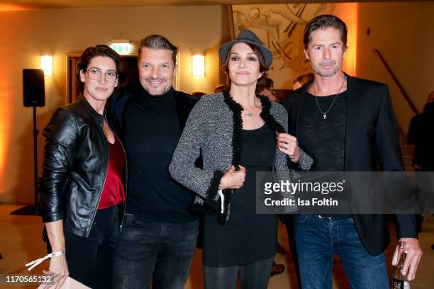 Alice Krueger with her husband German actor Hardy Krueger Jr. And German actress Anouschka Renzi with her boyfriend German actor Marc Zabinski during...