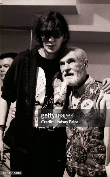 Joey Ramone hugs Timothy Leary backstage before Ramones concert at the Hollywood Palladium on March 11, 1994 in Los Angeles.