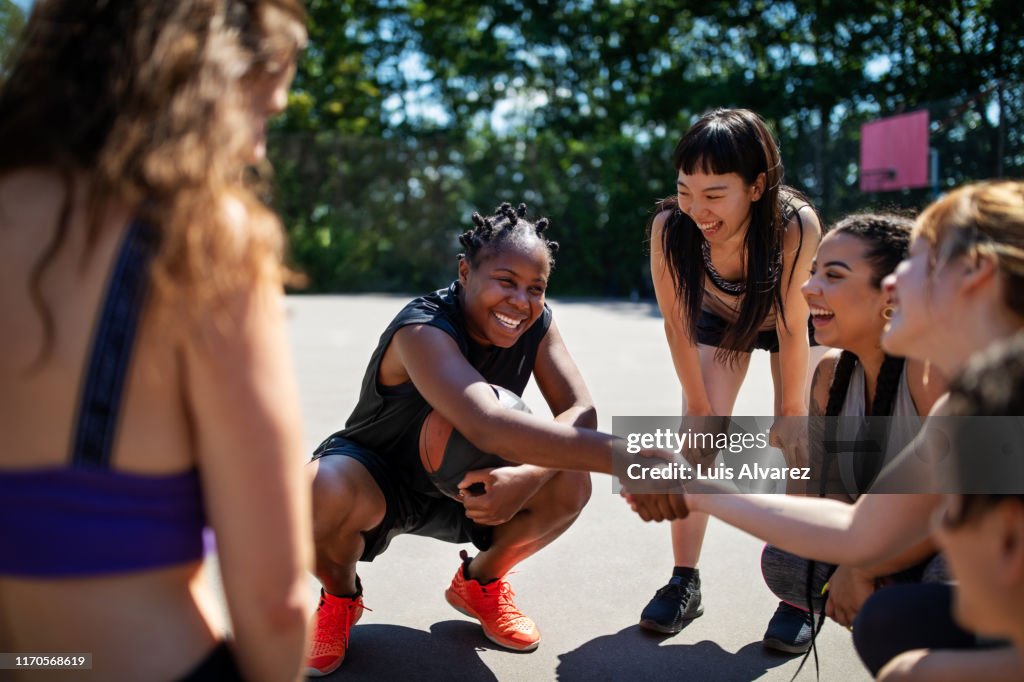 Basketball player shaking hands during a game plan