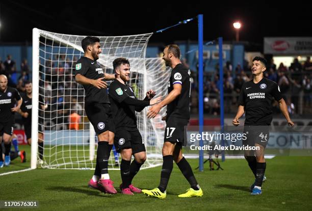 Glenn Murray of Brighton and Hove Albion celebrates scoring his team's second goal with team matesduring the Carabao Cup Second Round match between...