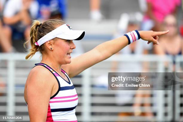 Kateryna Kozlova of the of the Ukraine disagrees with a call against Taylor Townsend of the United States during their Women's Singles first round...