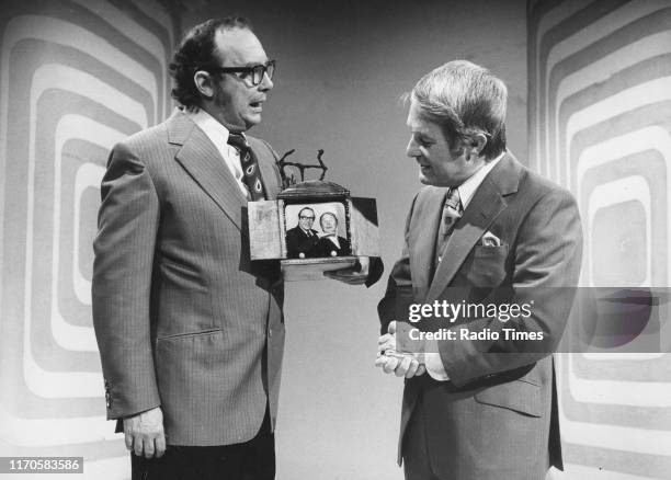 Comedy duo Eric Morecambe and Ernie Wise in a sketch for the BBC television series 'The Morecambe and Wise Show', August 8th 1972.