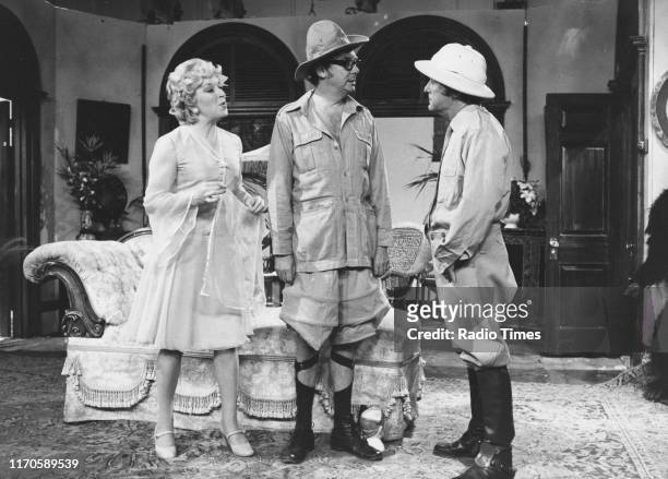 Comedy duo Eric Morecambe and Ernie Wise with actress June Whitfield in a sketch for the BBC television series 'The Morecambe and Wise Show', August...