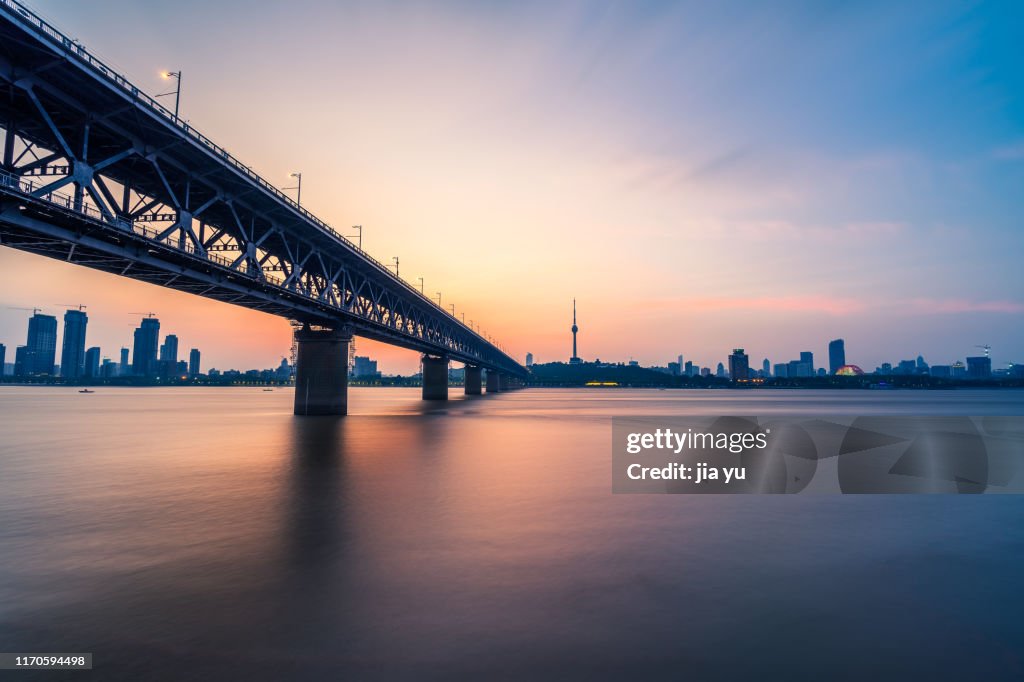 The Yangtze-river bridge with urban skyline on background,Wuhan