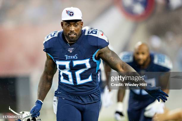 Delanie Walker of the Tennessee Titans runs onto field before a game against the Pittsburgh Steelers during week three of preseason at Nissan Stadium...