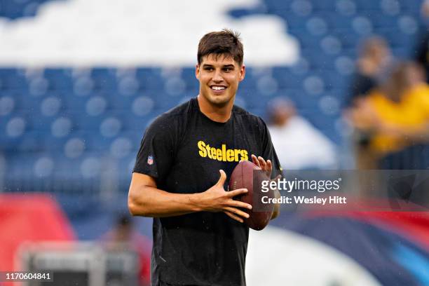 Quarterback Mason Rudolph of the Pittsburgh Steelers warms up before a game against the Tennessee Titans during week three of preseason at Nissan...