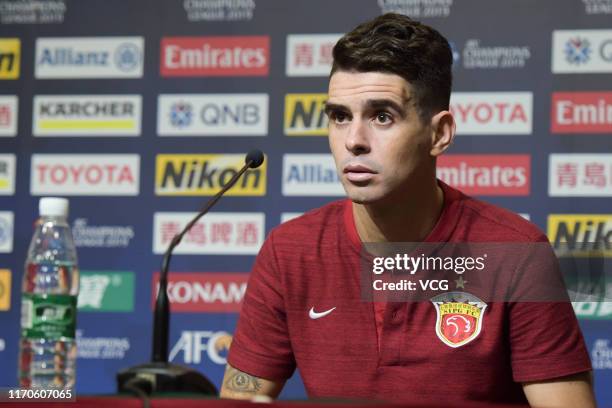 Oscar of Shanghai SIPG attends a press conference after the AFC Champions League quarter-final 1st leg match between Shanghai SIPG and Urawa Red...