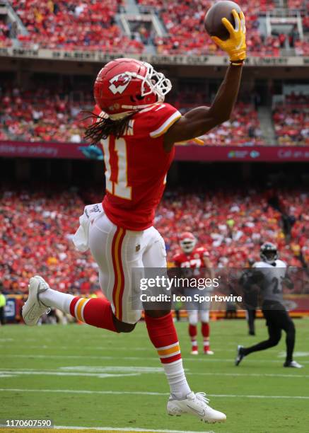 Kansas City Chiefs wide receiver Demarcus Robinson comes down with a one-handed catch for an 18-yard touchdown reception from quarterback Patrick...