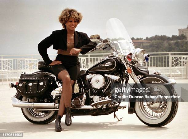 tina-turner-posing-with-a-harley-davidson-motorcycle-during-the-monte-carlo-music-festival-in.jpg