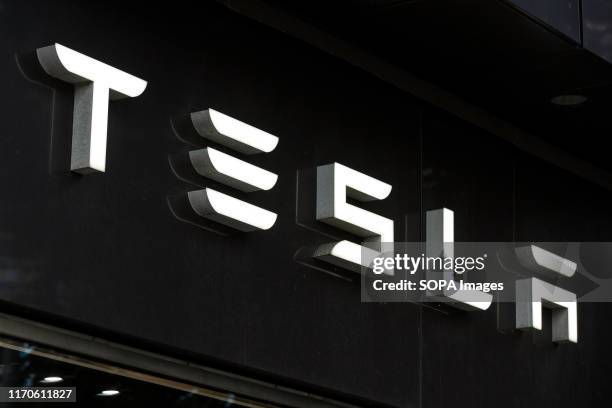 An American automotive and energy company that specialises in electric car manufacturing Tesla logo seen in Gothenburg.