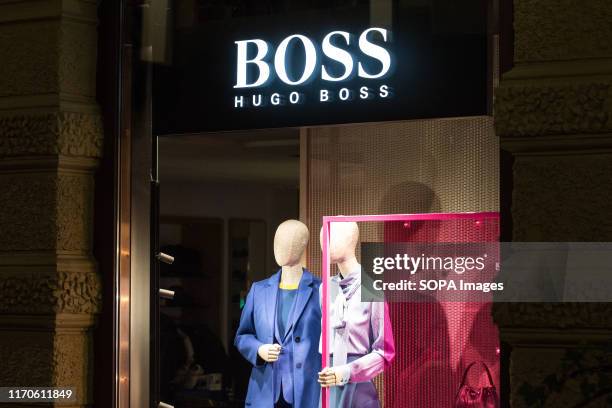 Hugo Boss logo seen in Gothenburg. Hugo Boss AG, often styled as BOSS, is a luxury fashion house headquartered in Metzingen, Germany.