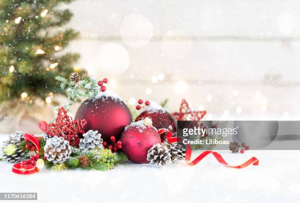 christmas baubles on a white wood background - country christmas stock pictures, royalty-free photos & images