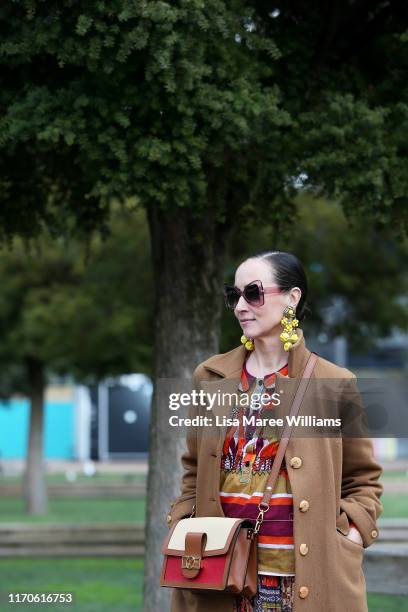 Patty Huntington wears a top by Alice McCall, vintage skirt and jewellery by Louis Vuitton during New Zealand Fashion Week 2019 on August 28, 2019 in...