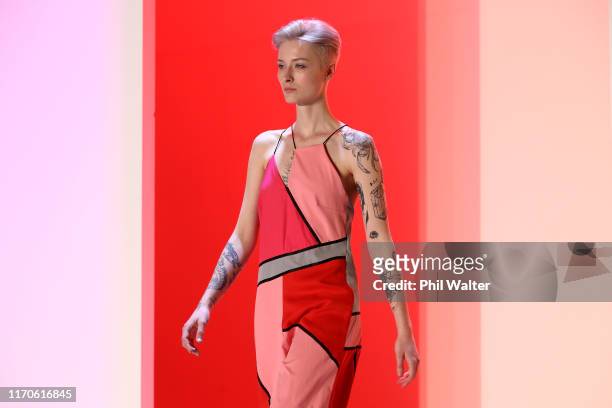 Model walks the runway in a design by Funky Town during The Graduate Show show during New Zealand Fashion Week 2019 at Auckland Town Hall on August...