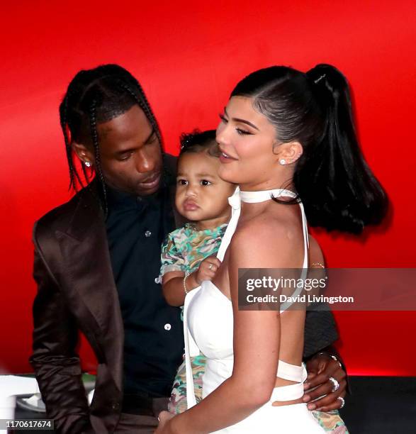 Travis Scott, Stormi Webster, and Kylie Jenner attend the premiere of Netflix's "Travis Scott: Look Mom I Can Fly" at Barker Hangar on August 27,...