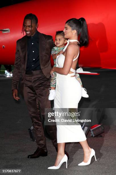 Travis Scott, Stormi Webster, and Kylie Jenner attend the premiere of Netflix's "Travis Scott: Look Mom I Can Fly" at Barker Hangar on August 27,...