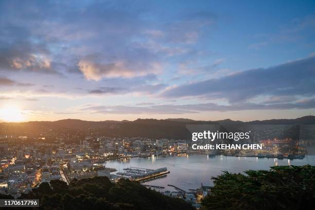 new zealand wellington sunset cityscape - wellington harbour stock pictures, royalty-free photos & images