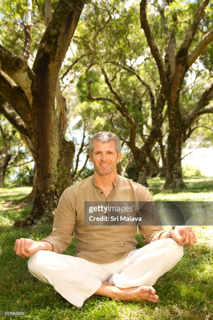 Meditating in park