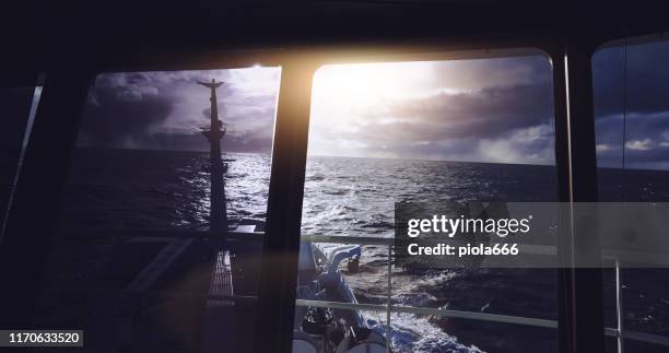 pov from the bridge of a boat sailing ocean - ships bow stock pictures, royalty-free photos & images