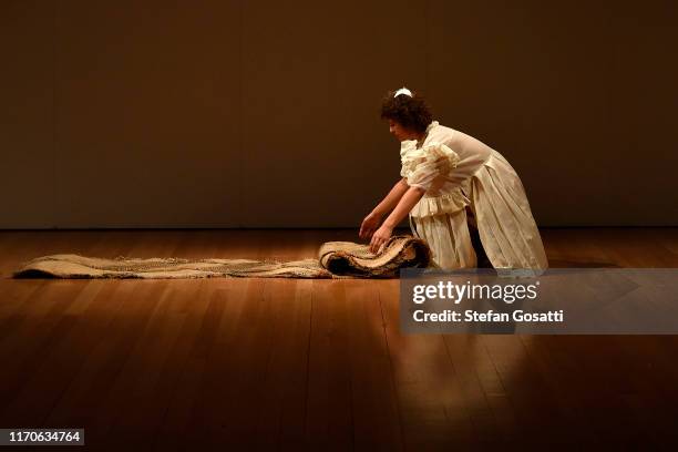 Model walks the runway during the Campbell Luke show during New Zealand Fashion Week 2019 at Auckland Town Hall on August 28, 2019 in Auckland, New...