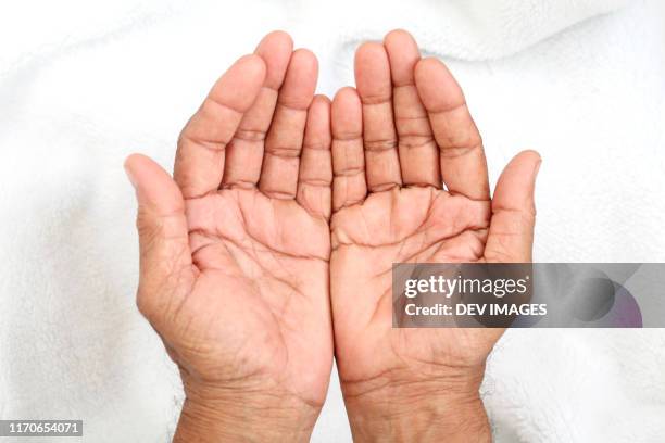hands in prayer position,close up - open hand stock pictures, royalty-free photos & images