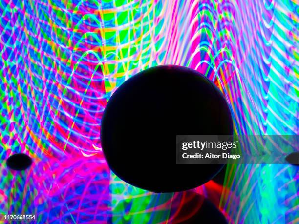 ball in the shape of earth or planet on reflective surface and futuristic background. - mapa múndi imagens e fotografias de stock