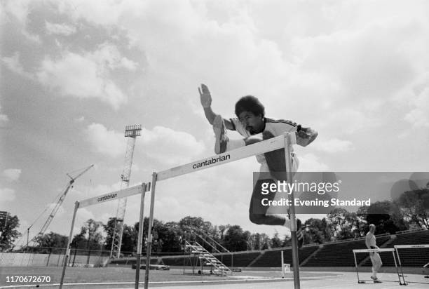 British decathlete Daley Thompson jumping over obstacles during trainig, UK, 1st June 1976.