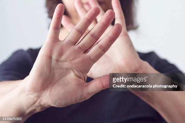 self defense gesturing - hand geste halt stock-fotos und bilder