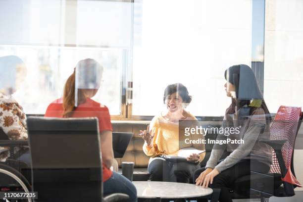 team meeting in conference room - market research stock pictures, royalty-free photos & images