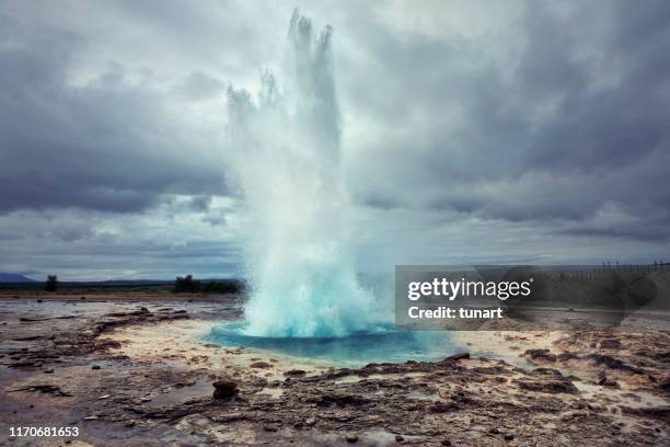 strokkur geyser in iceland - strokkur stock pictures, royalty-free photos & images