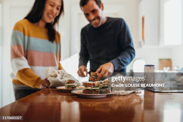 lunchtime at home - making sandwich stock pictures, royalty-free photos & images