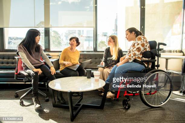Women in an office environment working collaboratively - Repicturing Disability