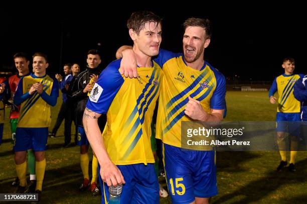 Brisbane Strikers players Matthew Richardson and Michael McGowan celebrate after their victory in the round of 16 FFA Cup match between the Brisbane...