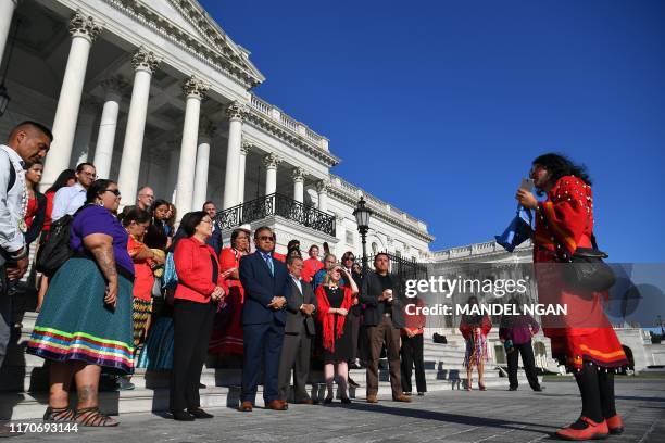 People gather as the Administration for Native Americans at the Health and Human Services Department, the National Council of Urban Indian Health,...