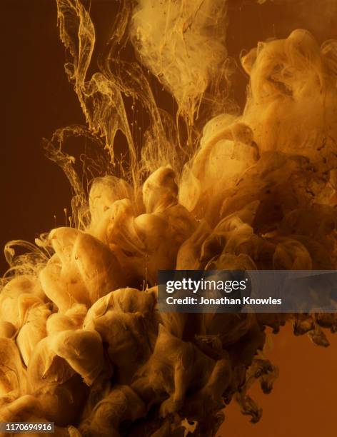 underwater brown cloud - golden clouds stock pictures, royalty-free photos & images