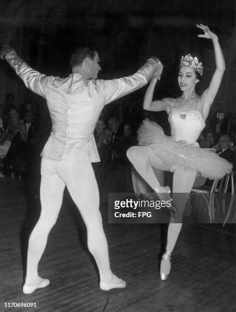 American ballerina Maria Tallchief , prima ballerina of the New York City Ballet, and a male dancer performing on the floor of the Grand Ballroom at...
