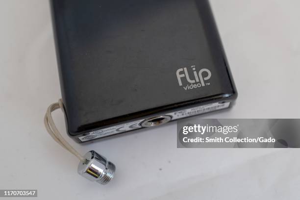 Close-up of logo for Flip Video on Mino HD miniature camcorder, ca 2008, among the first High Definition miniature camcorders, on a white background,...