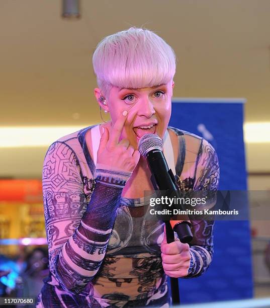 Singer Robyn performs during JetBlue's Live From T5 concert series at Terminal 5 at JFK Airport on June 20, 2011 in New York City.