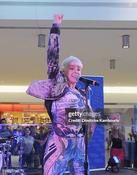 Singer Robyn performs during JetBlue's Live From T5 concert series at Terminal 5 at JFK Airport on June 20, 2011 in New York City.