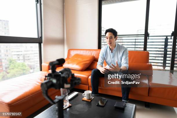 video interview - asia broadcast stock pictures, royalty-free photos & images