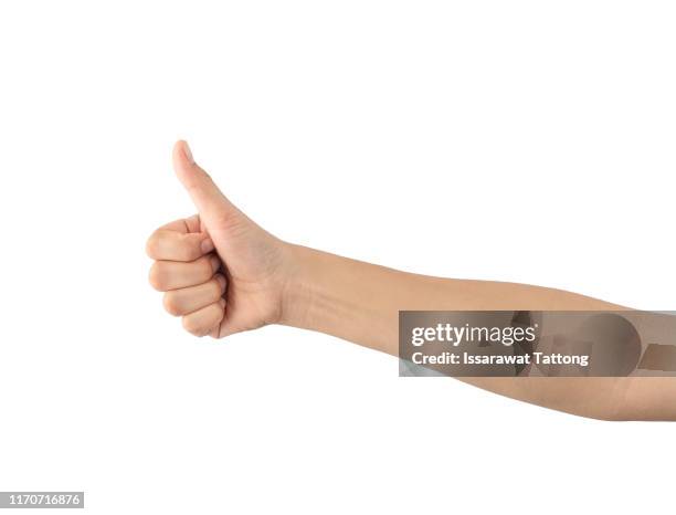 hand showing thumbs up sign against isolated on white background - 親指を立てる ストックフォトと画像