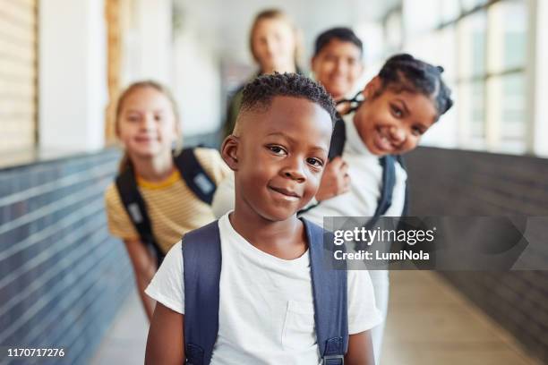 stand in front of your future with confidence - kids in a row stock pictures, royalty-free photos & images