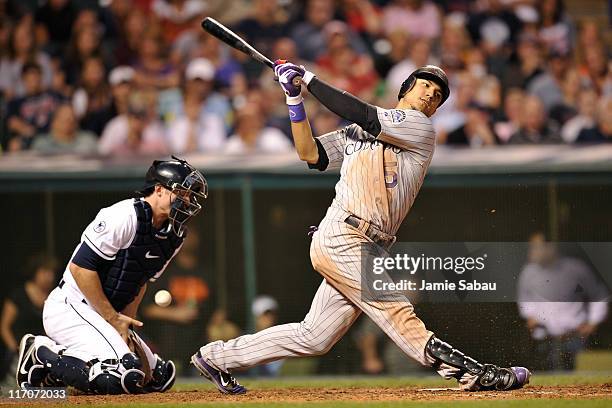 Carlos Gonzalez of the Colorado Rockies strikes out swinging against the Cleveland Indians at Progressive Field on June 20, 2011 in Cleveland, Ohio....