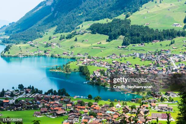 lakescape of lake lucerne, burglen town in nidwalden canton, switzerland - schwyz stock pictures, royalty-free photos & images