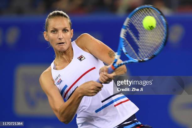 Karolina Pliskova of the Czech Republic returns a shot during the match against Amanda Anisimova of The United States on Day 3 of 2019 Dongfeng Motor...