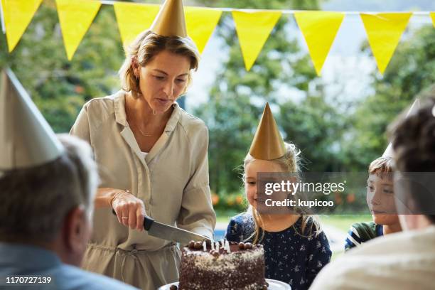 the birthday girl gets the biggest slice - biggest cake stock pictures, royalty-free photos & images